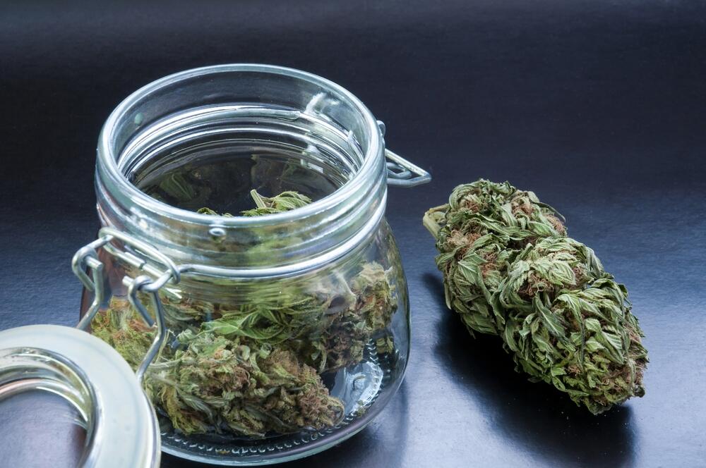 an eighth of weed stored in a mason jar